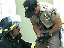Fireman loves tasting a cop's cock